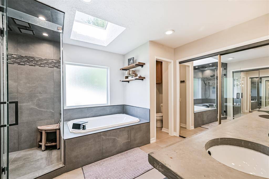 Jacuzzi soaking tub for spa-like relaxation.