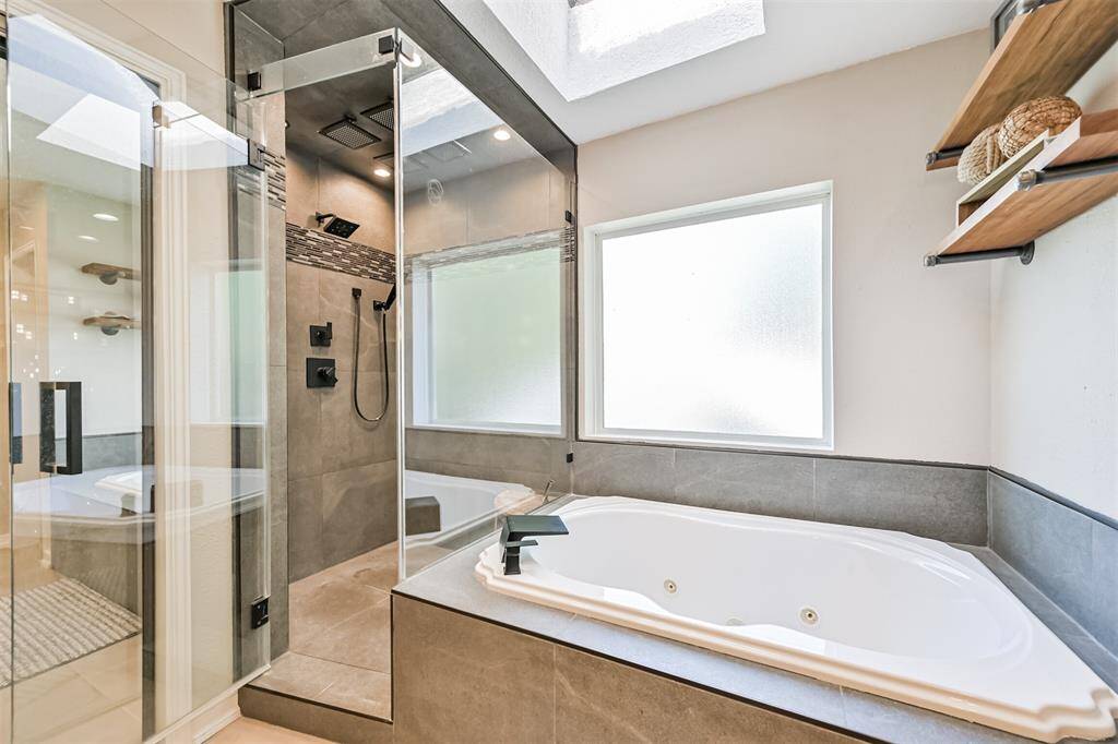 Oversized shower with multiple shower heads/settings.