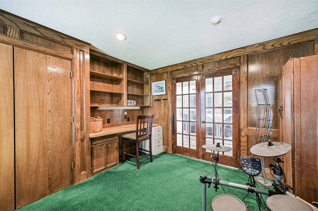 French doors offer privacy with style, flexible space for work or creativity.
