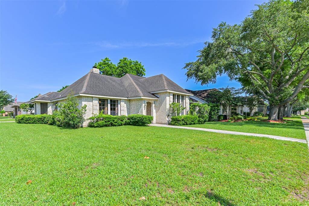 Large corner lot with mature landscaping.