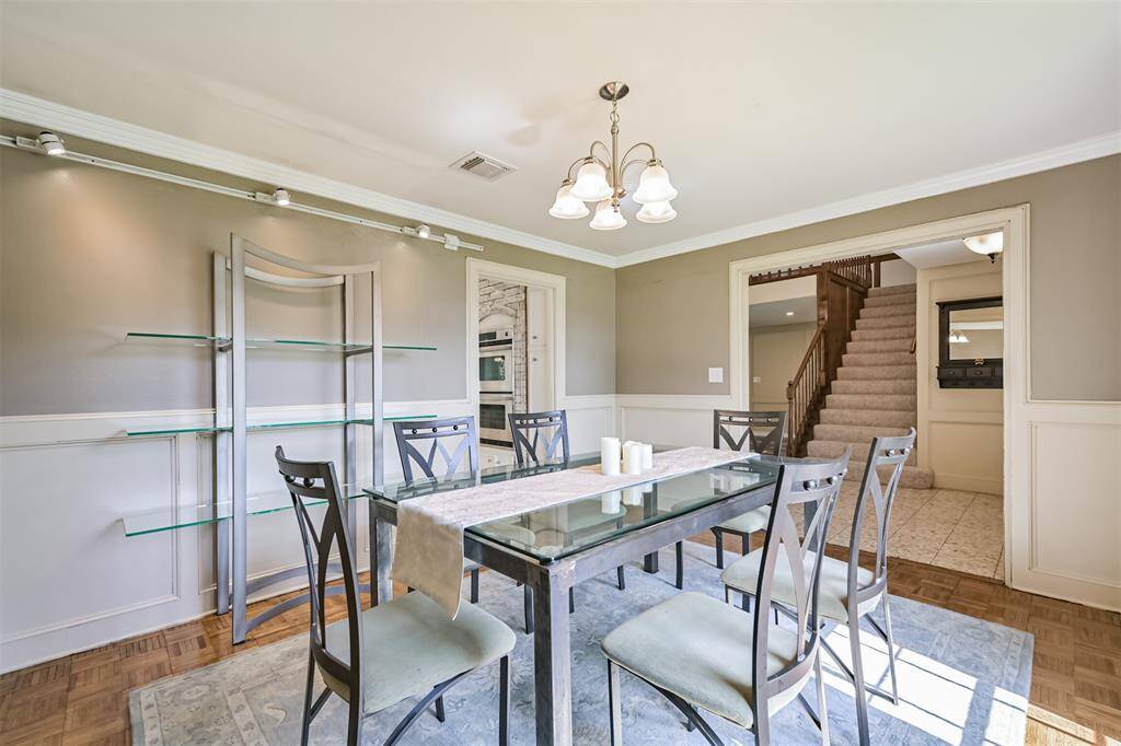 Crown molding and chair rail for timeless elegance.