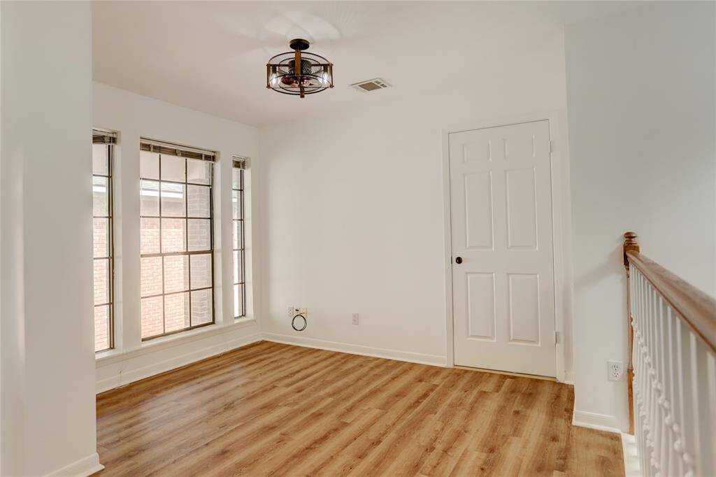 The 2nd floor Flex Room is functional as a Game Room, Office, Gym, or other.