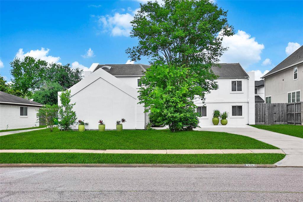 Beautiful Curb Appeal with added extension of the driveway.