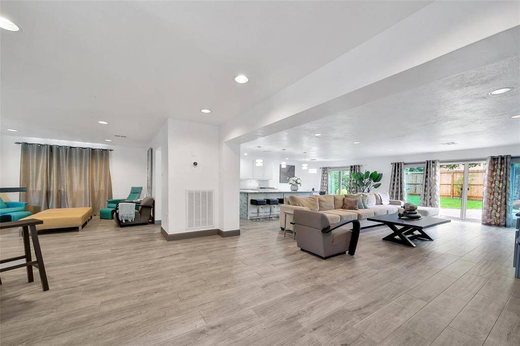 Upgraded Open Floor Plan Kitchen & Breakfast Area & Living Room- Upgraded Windows Double Panel on the First Floor facing the backyard/pool.