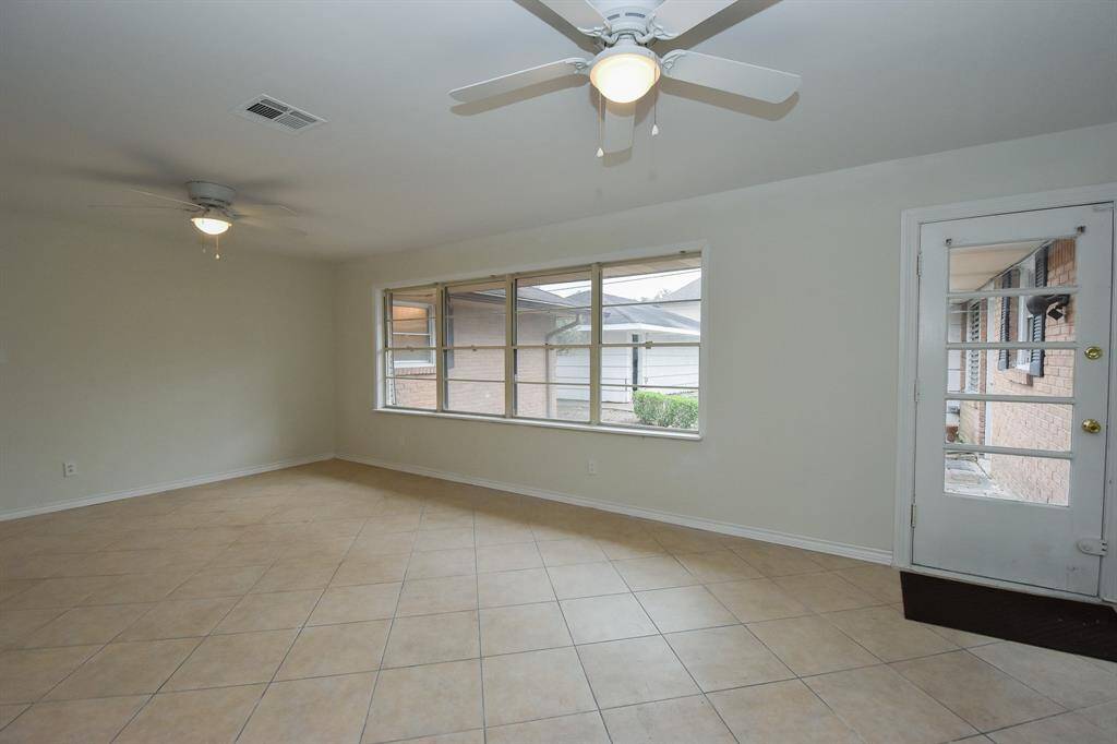 Family room has french door leading out to the patio and backyard.