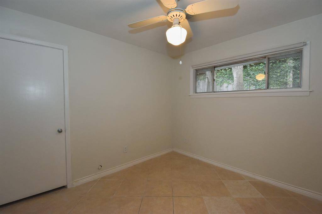 You can use this room off the 4th bedroom as a siting room or study.