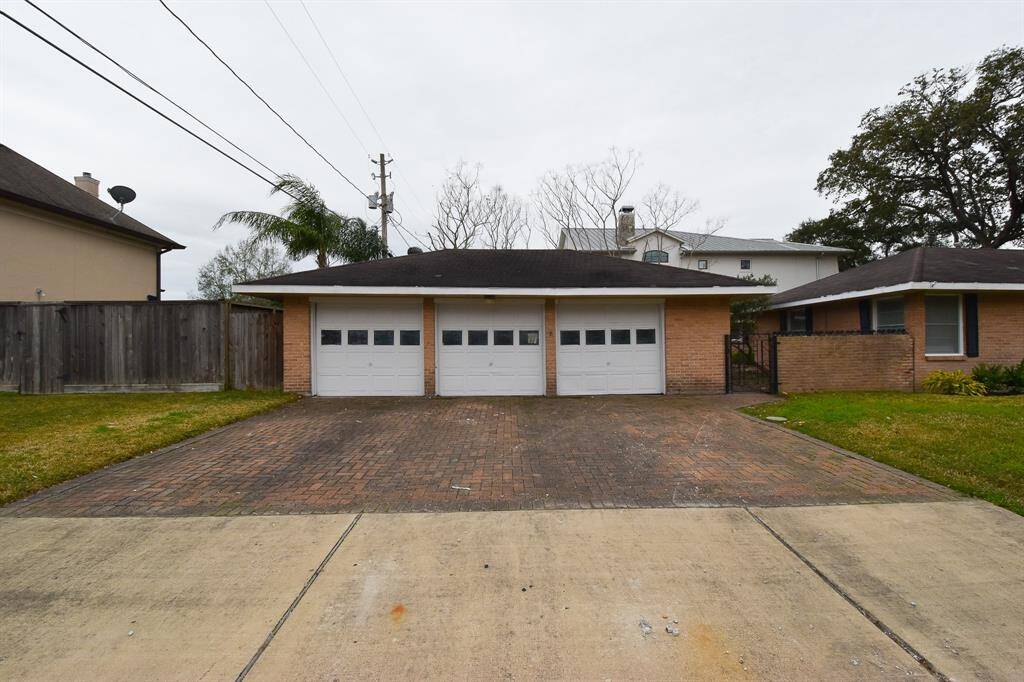 Detached, three car garage.