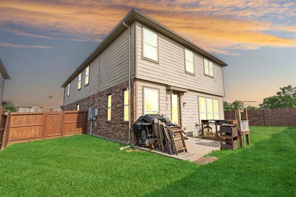 Fully fenced back and side yard