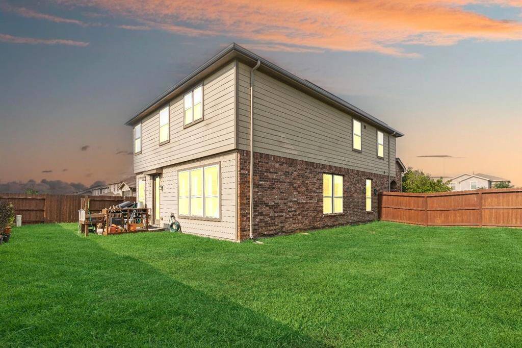 Fully fenced back and side yard