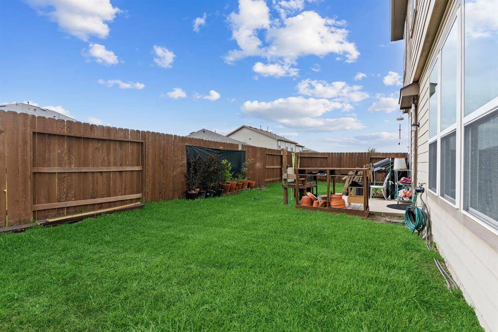 Fully fenced back and side yard