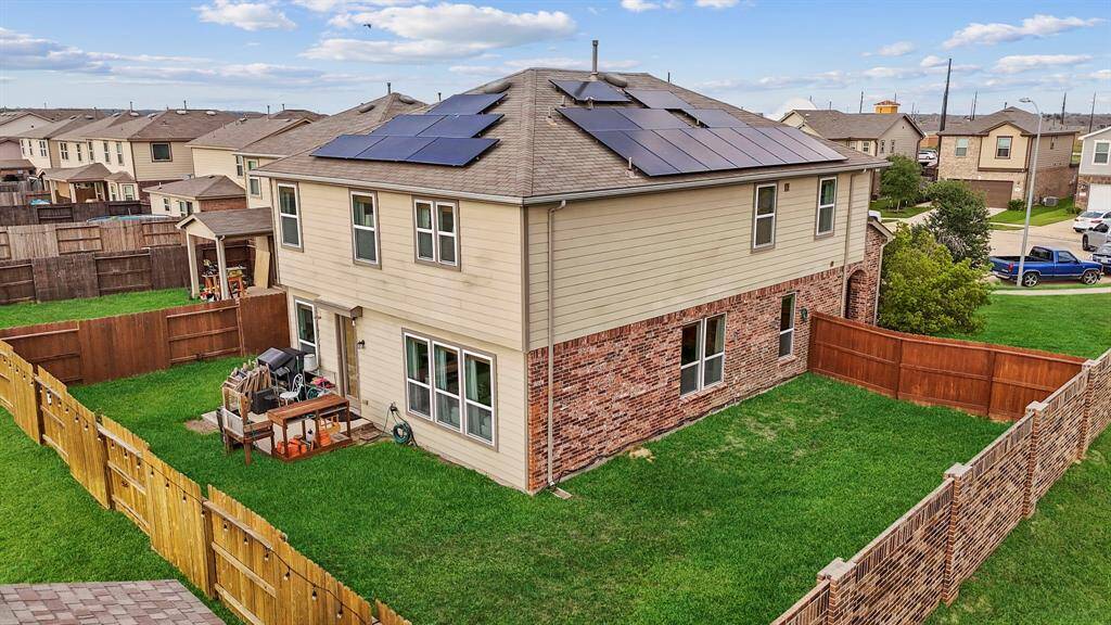 Fully fenced back and side yard