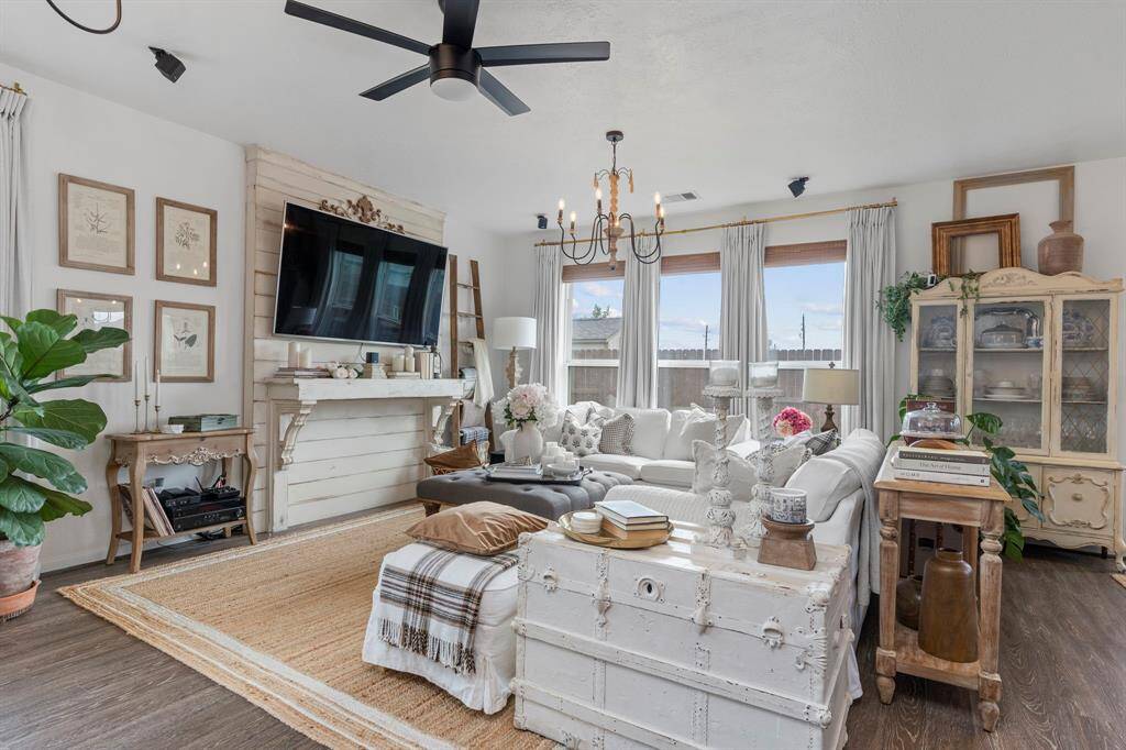Spacious living room with big windows allowing ample lighting