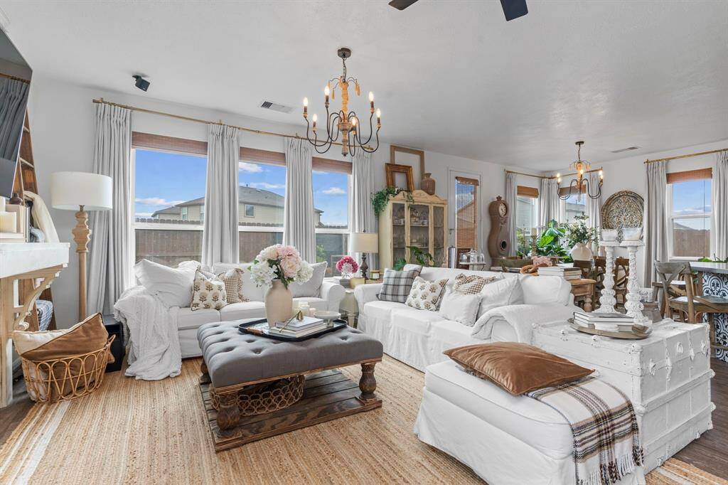 Spacious living room with big windows allowing ample lighting