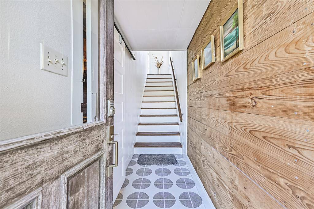 Beautiful, rustic, wooden door entry. So inviting!