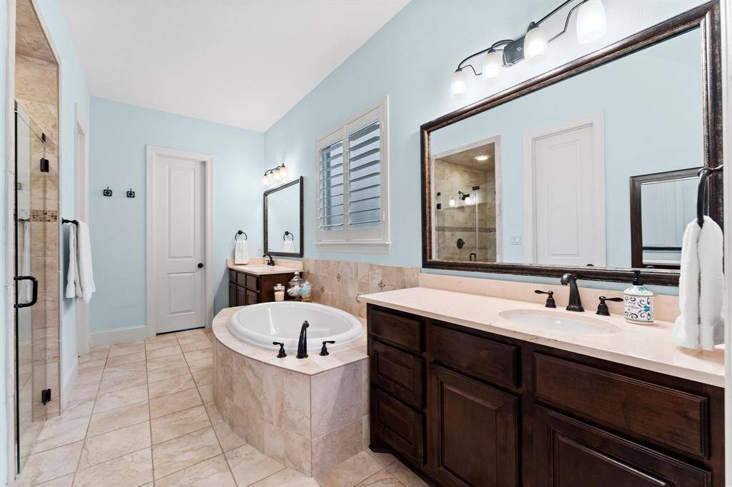 Spa like master bath with generous walk in closet
