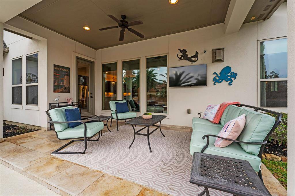 Covered patio off the kitchen provides extra living and entertaining space