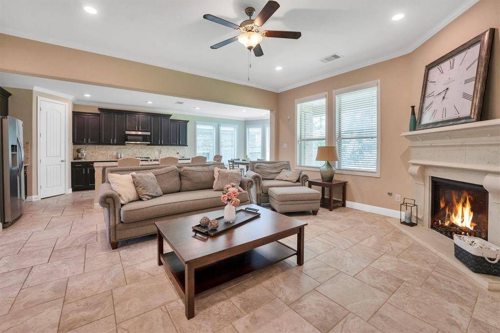 Another view of the family room with the kitchen behind.