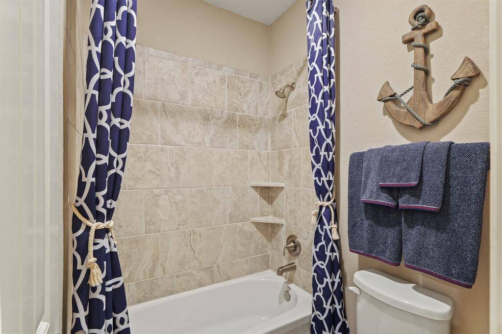 It is complete with a shower/tub combo, and gorgeous tile walls.
