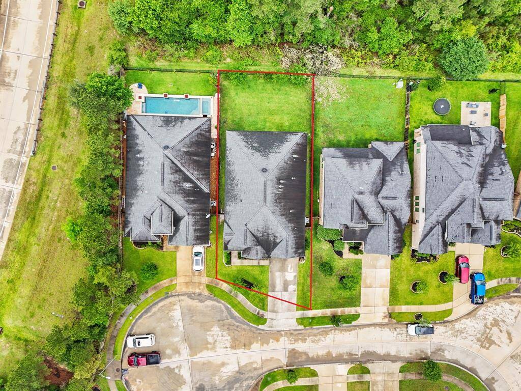 This aerial view showcases the INCREDIBLE 7,161 sqft Cul-de-Sac lot.