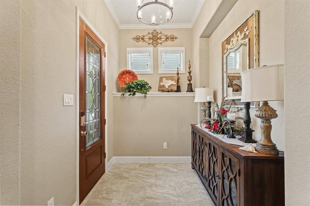 This lovely front foyer creates a true sense of arrival to your home.