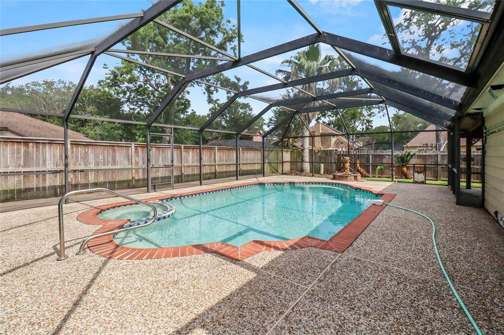 Screened in pool and hot tub