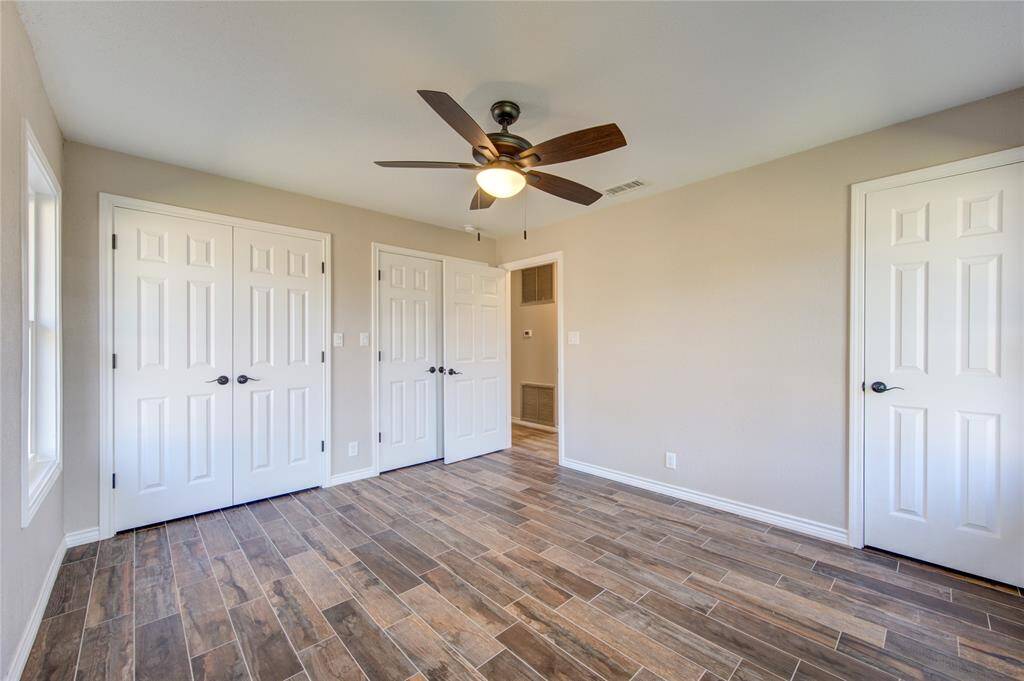 Double closets with ensuite bathroom make this primary bedroom a private sanctuary.