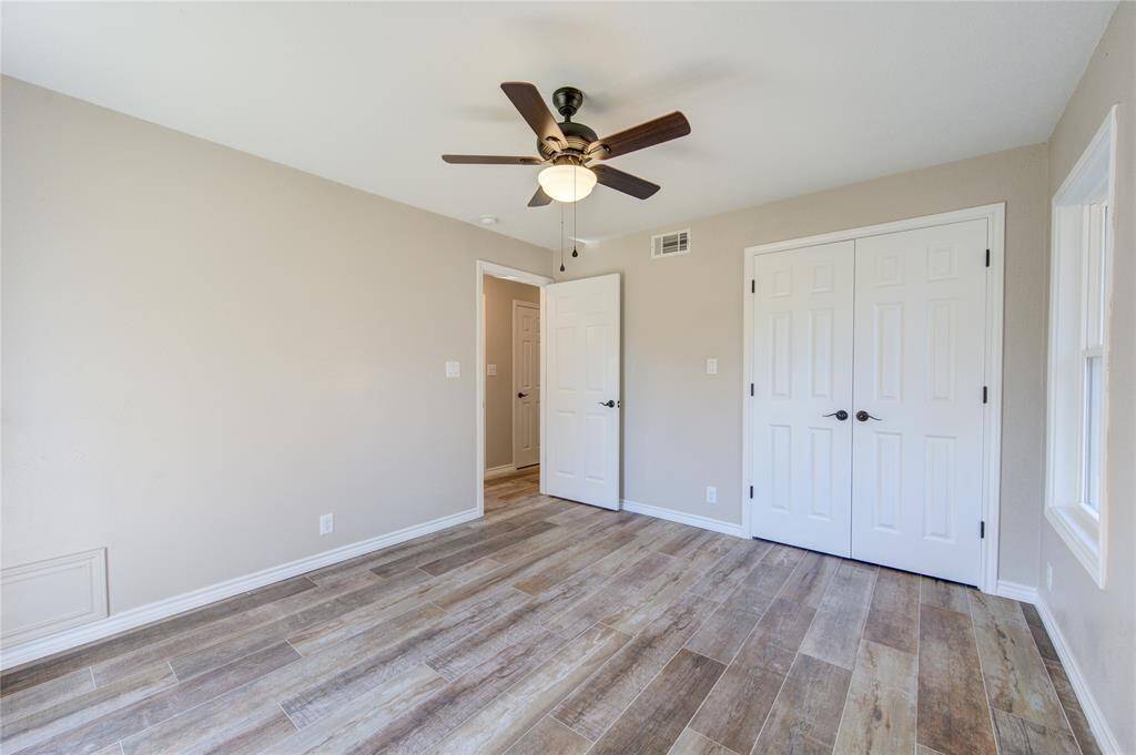 This secondary front bedroom, which mirrors the middle bedroom also has plenty of natural light, making it bright and airy!