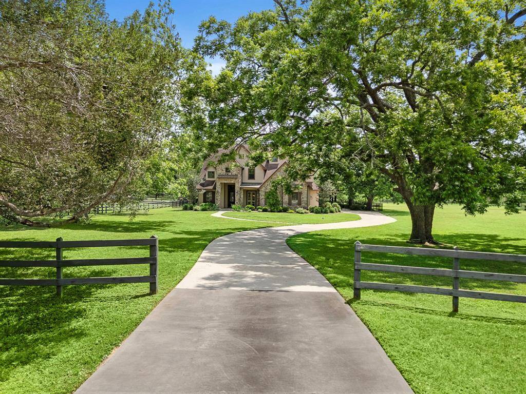 Welcome home to 5334 Harris Woods Trace in Fulshear, TX!
