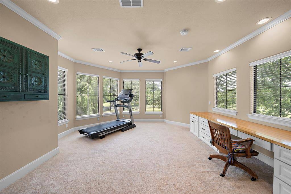 Versatile bonus room connected to the upstairs living area, perfect for a home office or playroom.