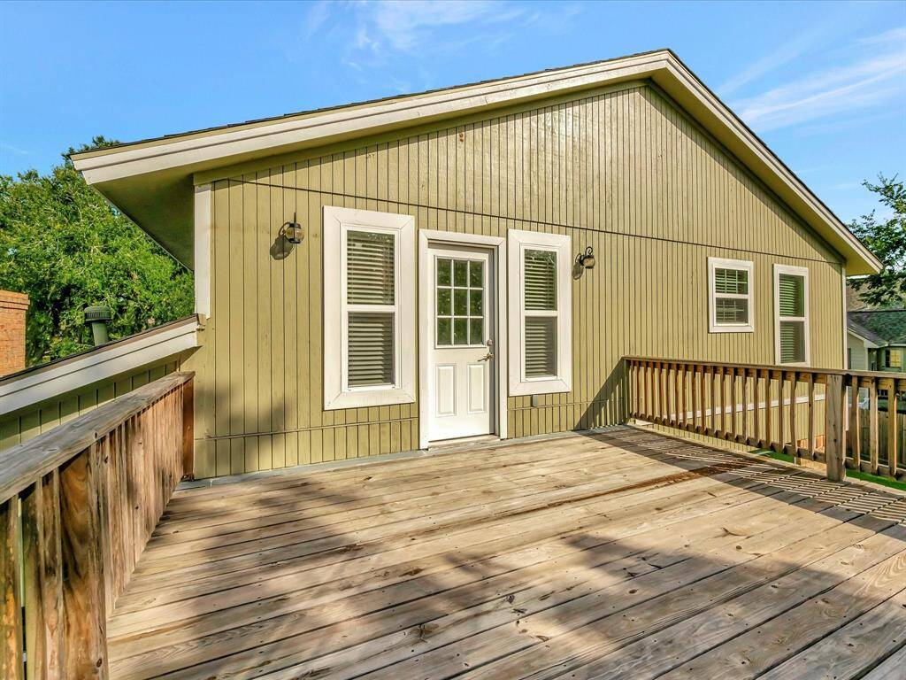 Guest bedroom leads to Deck overlooking spacious backyard
