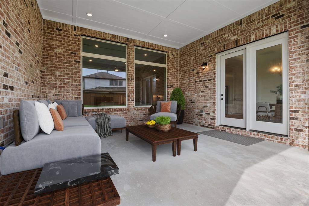 Functional and spacious covered porch.