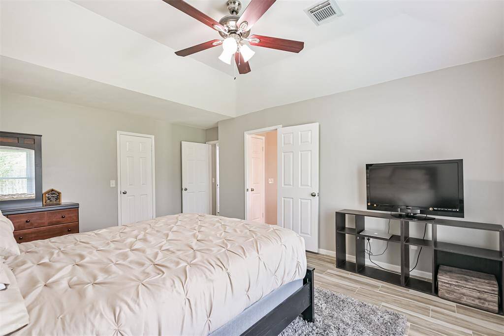 Primary bedroom featuring large walk in closet