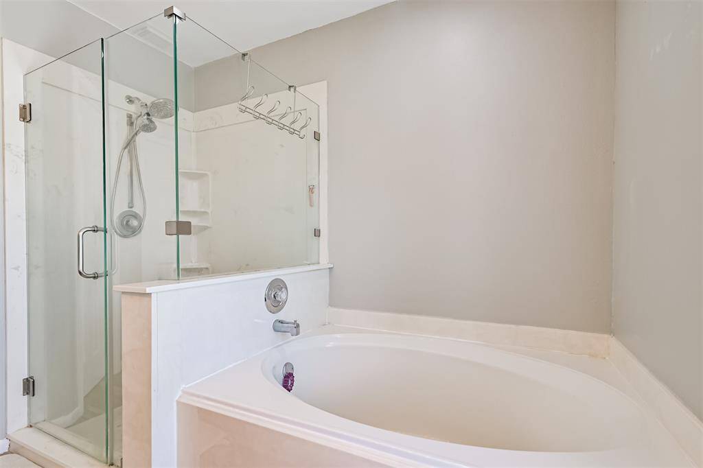 Primary bathroom - separate shower and soaking tub