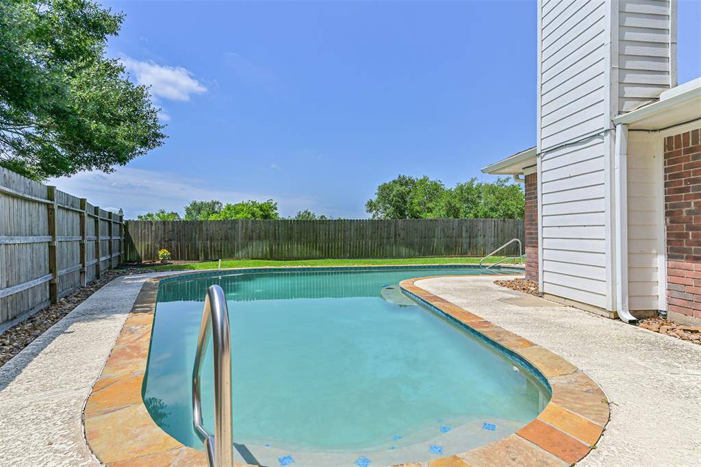 Second pool entry on side of house, the pictures don't do it justice, come see this backyard oasis for yourself