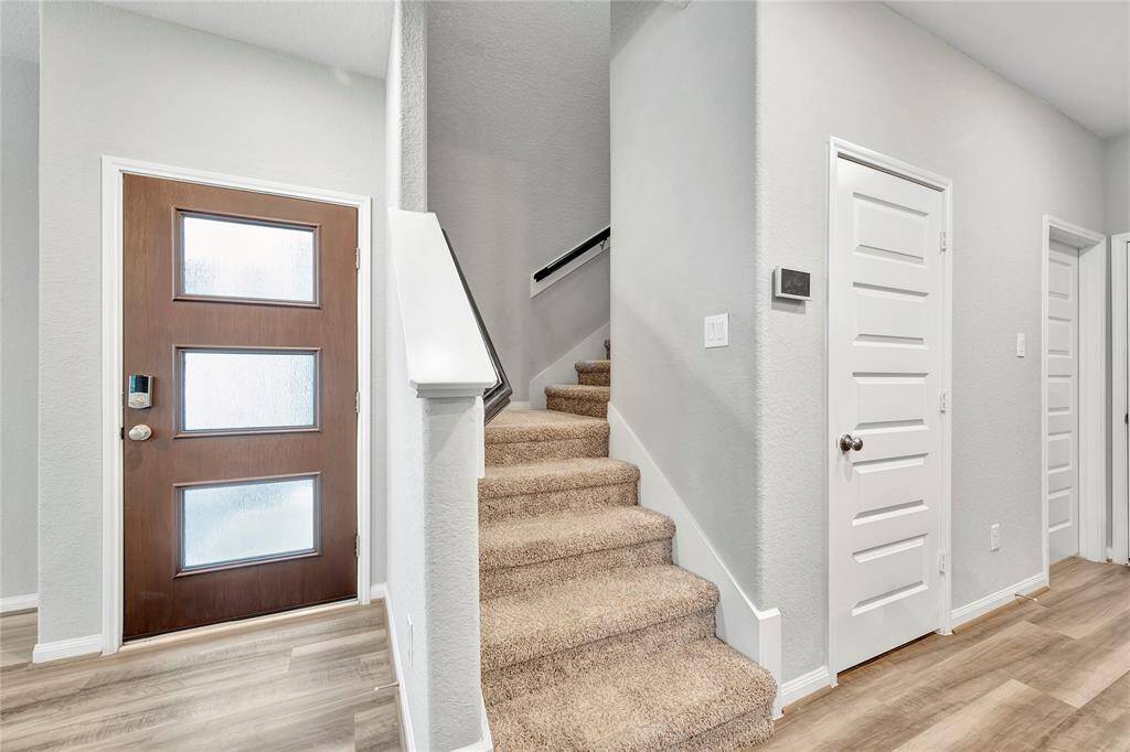 Closet beneath the stairs provides additional storage for an array of personal items. i.e. bicycle, weights or Christmas decorations.
