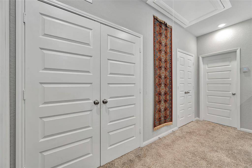 Utility room conveniently located at the top of the stairs.