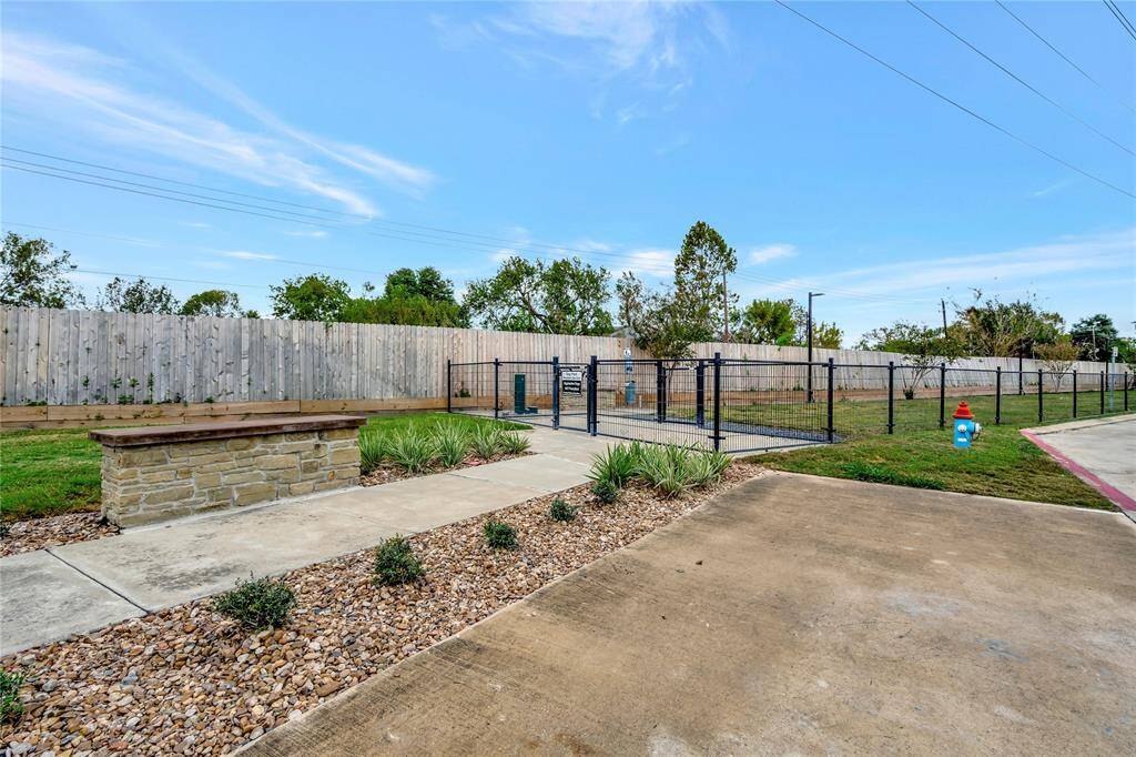 This property features a convenient dog park, offering a safe and spacious area for your furry friends to run, play, and socializ
