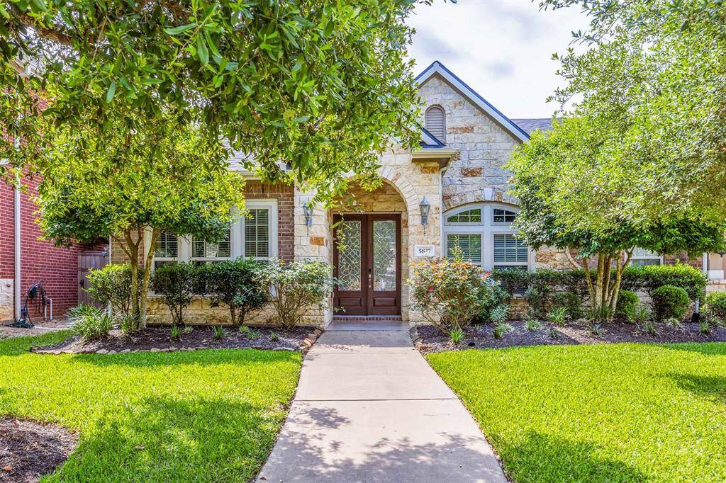 Welcome to this stunning David Weekly home, beautifully framed by mature trees and lush landscaping. With 4 bedrooms and 3 full baths, this elegant home offers an inviting curb appeal in sought-after Cross Creek Ranch.