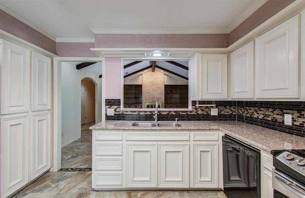 Kitchen opens to living room
