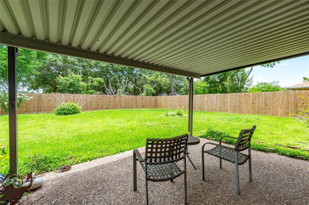 Relax or entertain year-round under the covered patio, perfect for outdoor dining or lounging in any weather.