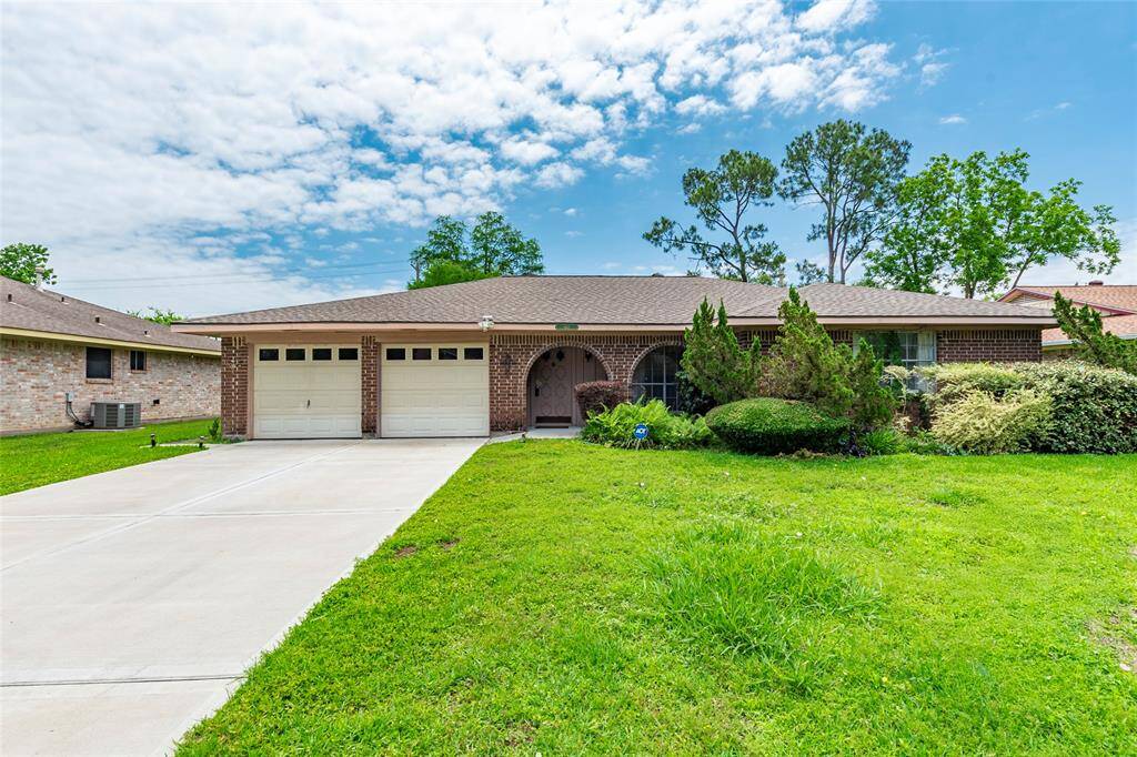 Crisp curb appeal with brand new driveway, sidewalk, and welcoming front porch
