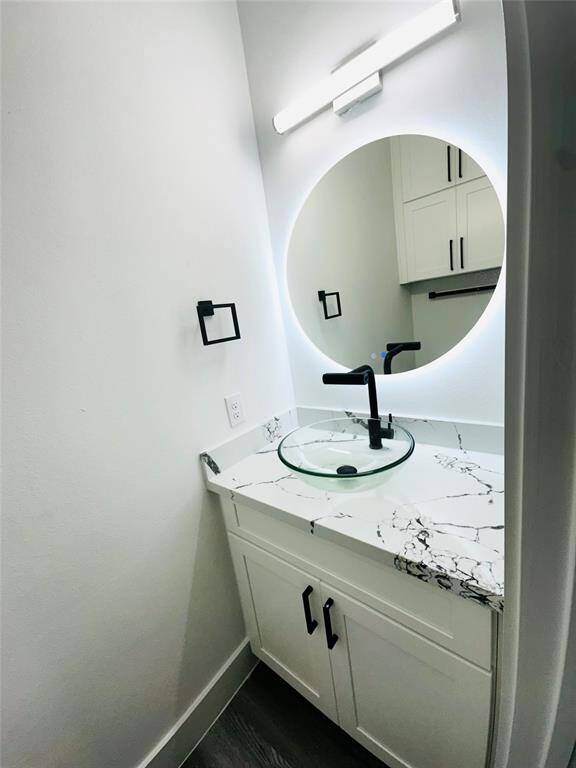 1/2 bath Powder room on the 1st floor for your guest. Buyer can choose between brushed Nickel or Matte Black faucets and hardware.