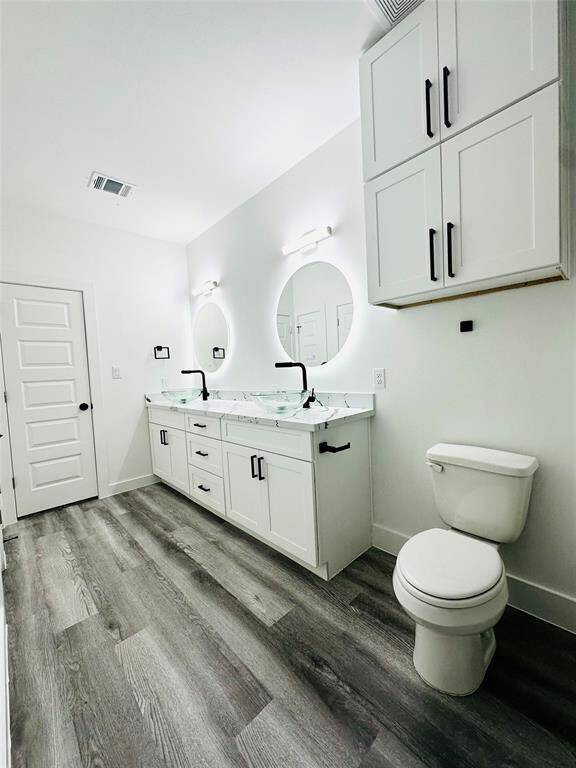 Wake up to a magazine worthy bathroom every morning featuring beautiful quartz countertops, LED backlit multi function mirrors, double all glass vanity vessel sinks, double stacked head knocker cabinets over the toilet, spa grade faucets and hardware plus more. Buyer can choose between brushed Nickel or Matte Black faucets and hardware.