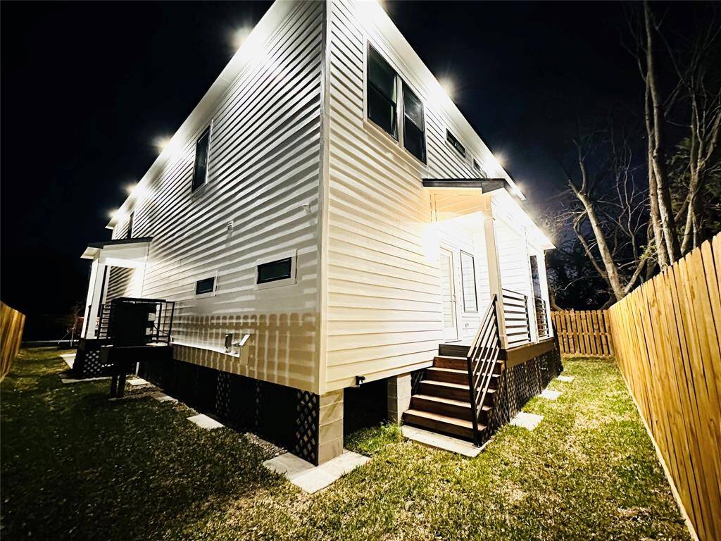 Each unit features covered back patio, recessed 360 degree LED soffit lighting, 2 inch wrought iron custom made handrails and balusters, and privacy fence w/ a wood picket gate to enclose the side yard & back yard.