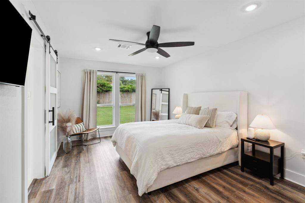 Charming primary suite that has 2 walk in closets.