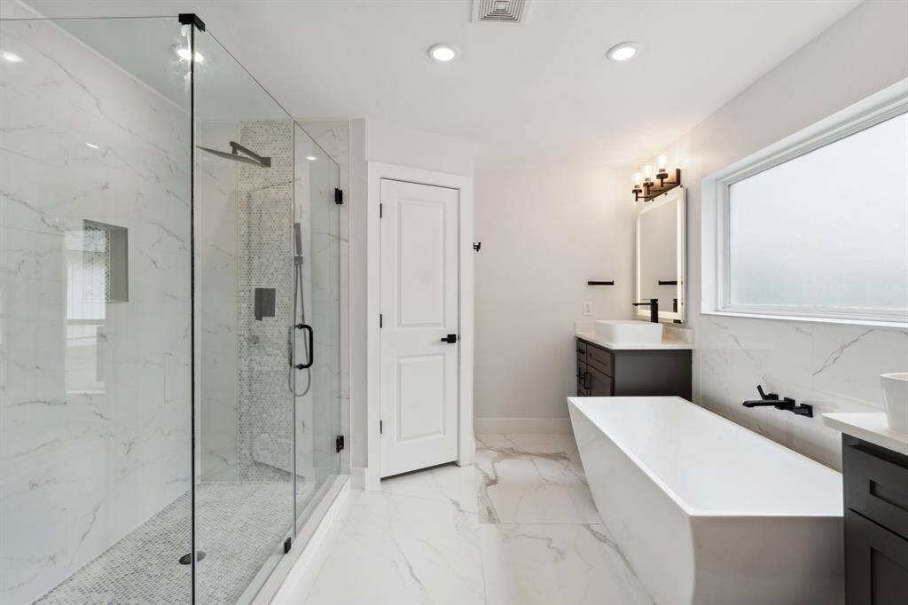 Huge shower with separate soaking tub.