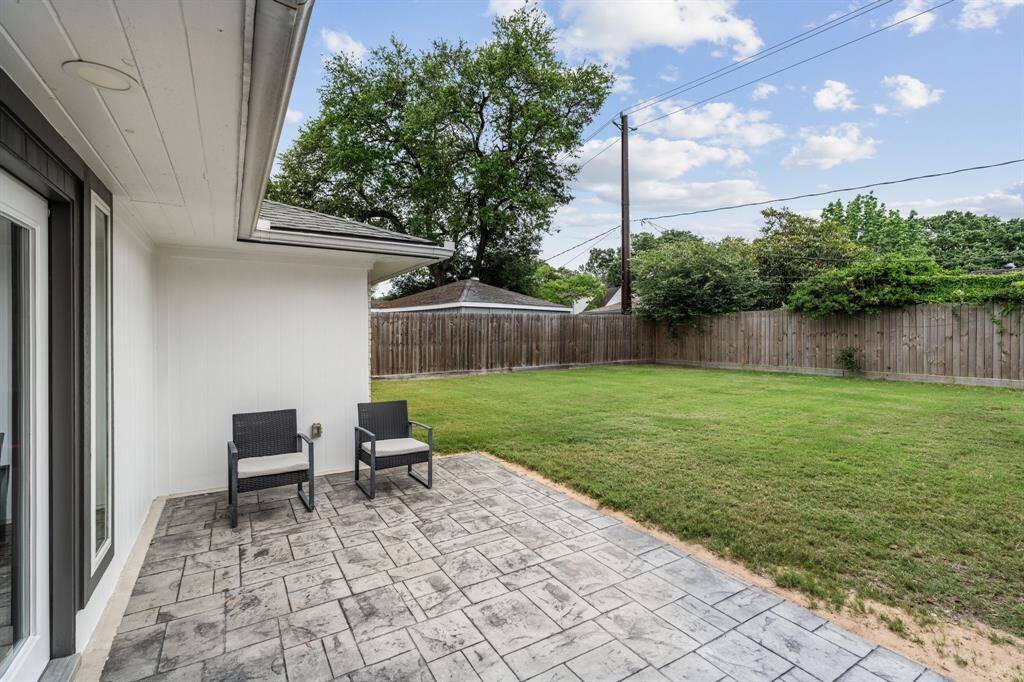 Brand new patio in the backyard. 7 foot privacy fence.