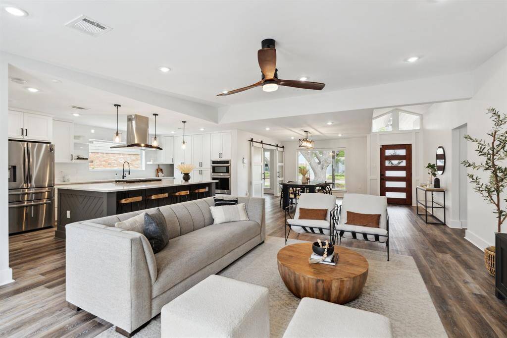 Open floor plan with natural light from all directions.