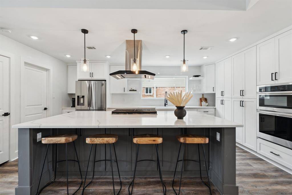 Large island in the kitchen with storage under.
