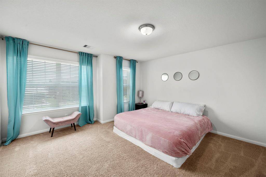 This is one of the secondary bedrooms and it is very spacious.